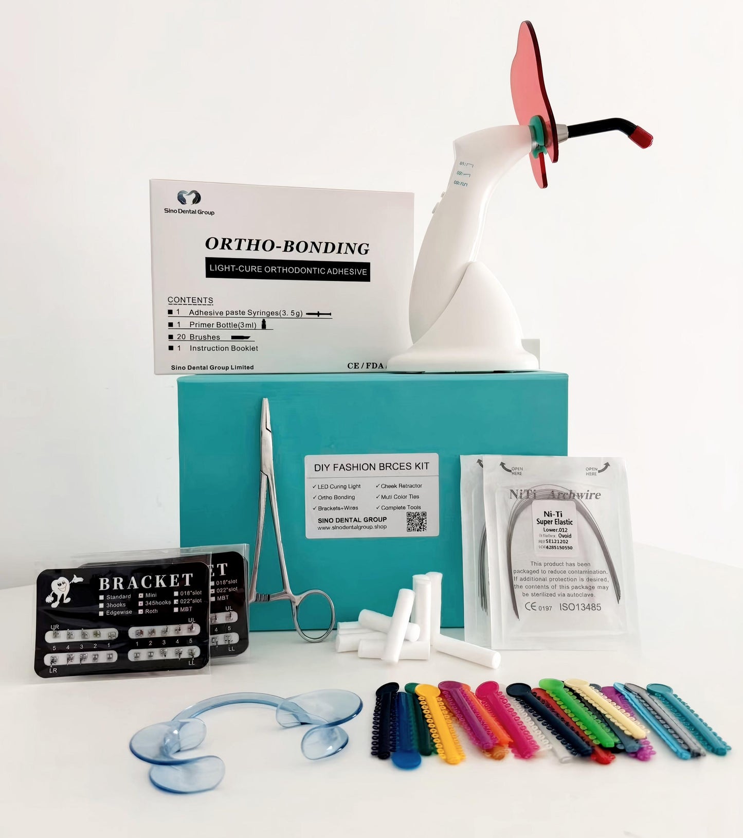 Sino Dental DIY fashion braces kit complete set with 20 color powerchains, LED curing light, brackets, wires, and tools displayed in Tiffany blue gift box